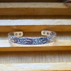 Elegant Silver Bracelet with Intricate Design